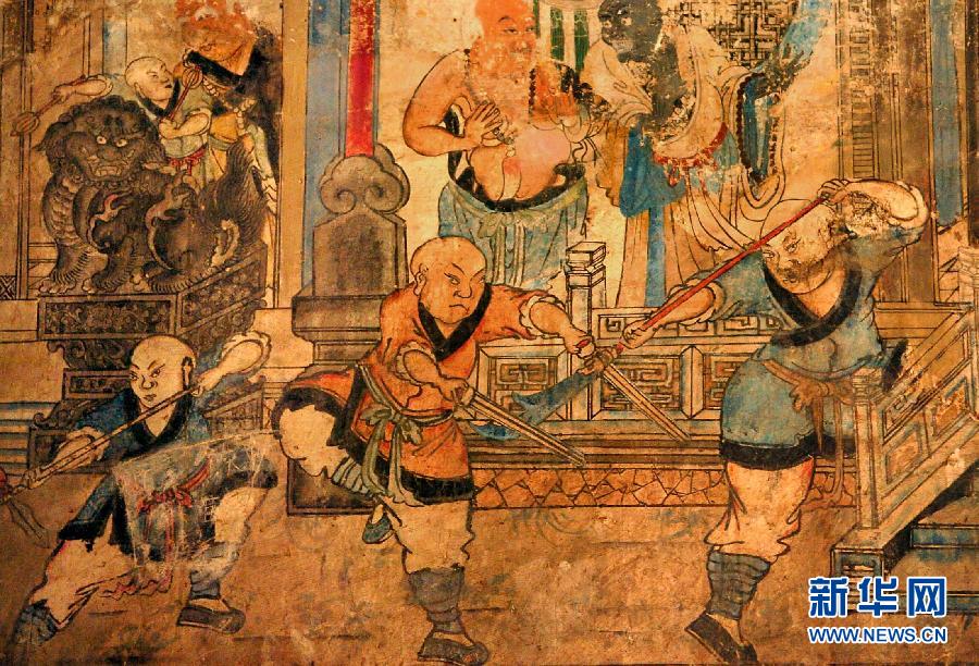 少林寺白衣殿內(nèi)的墻上表現(xiàn)少林武僧習(xí)武練拳的壁畫(局部,2005年9月15日攝)。