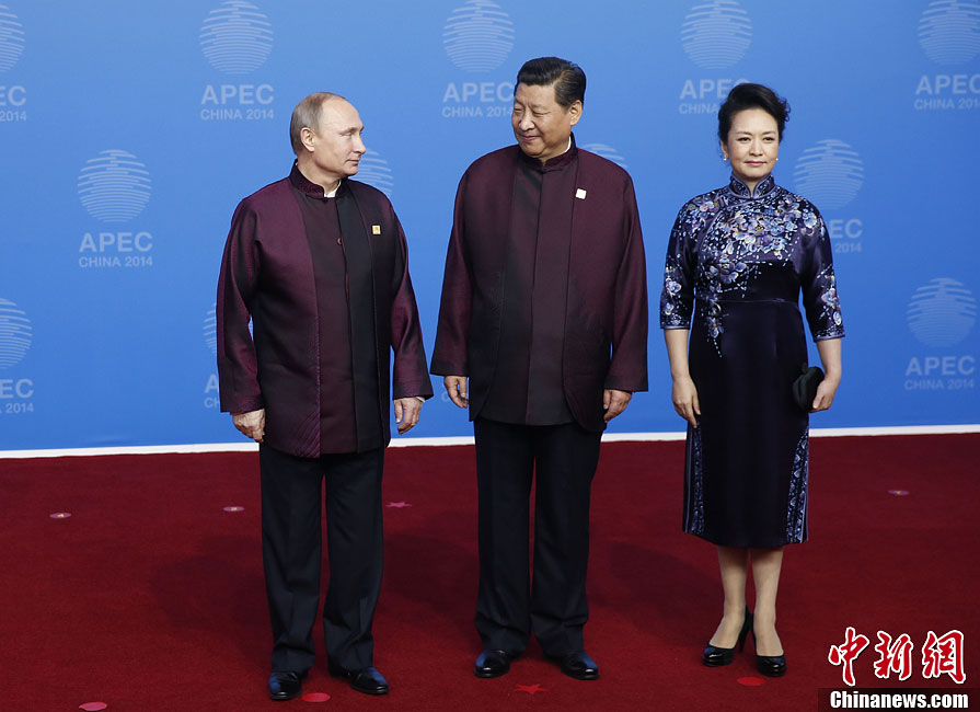圖為習(xí)近平夫婦歡迎俄羅斯總統(tǒng)普京。中新社發(fā) 杜洋 攝